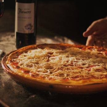 What Wine Goes with Pizza: A Guide to Wine and Pizza Combinations